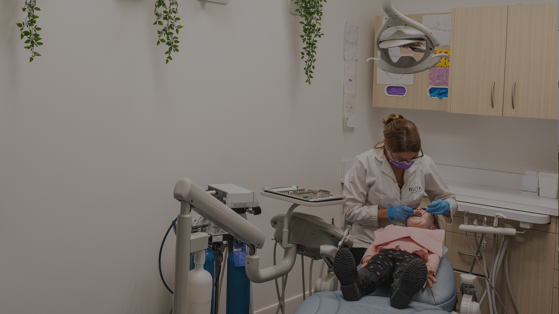 A child has a regular checkup at BLOK Dental